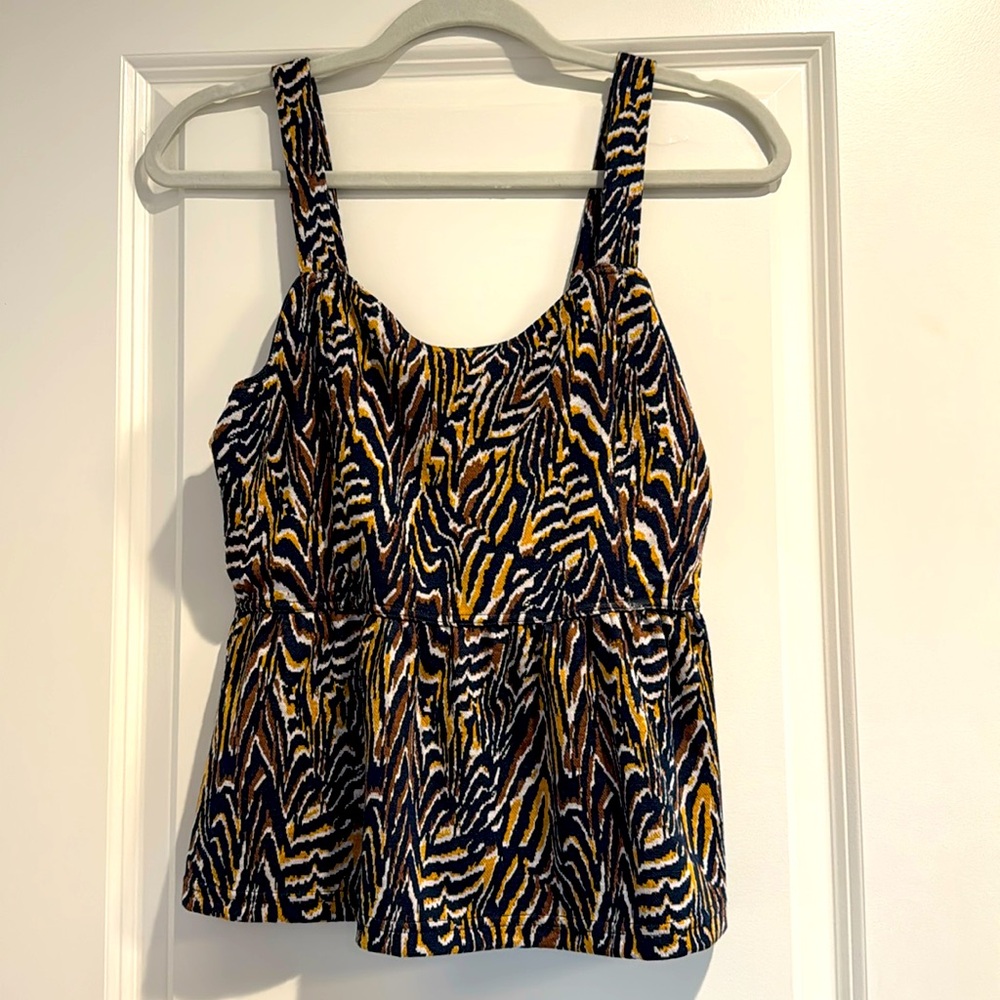 Anthropologie peplum knit top